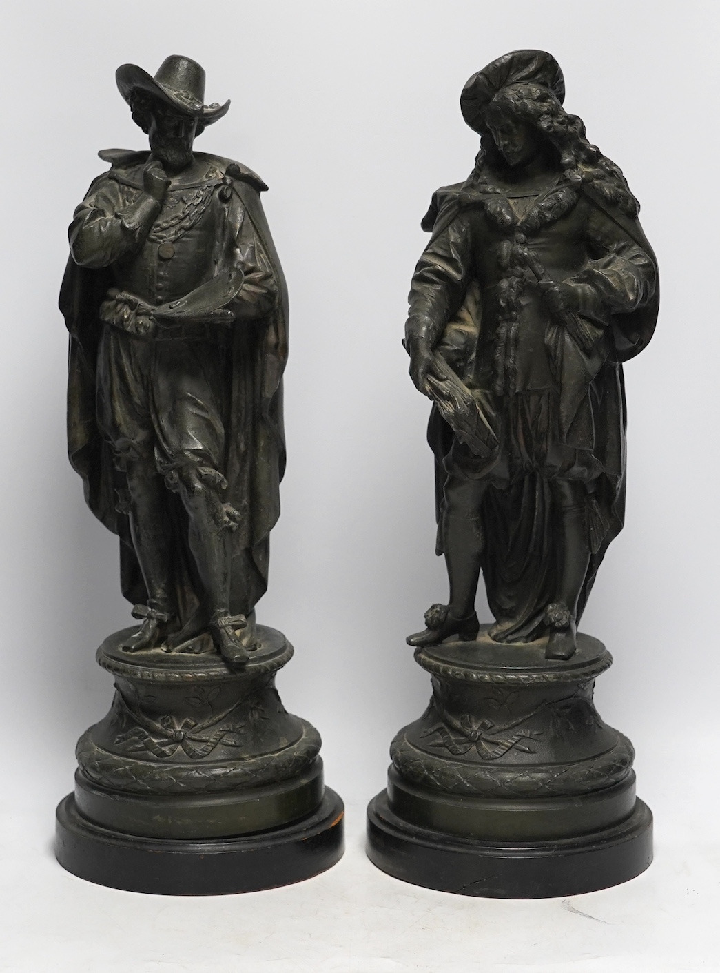 A pair of early 20th century spelter figures of cavaliers, 49cm